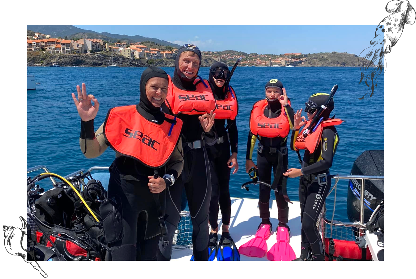 Tutrice avec son stagiaire pédagogique sur une session de snorkeling en mer sur un bateau